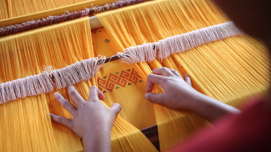 Hand weaving; art of producing woven textiles by hand