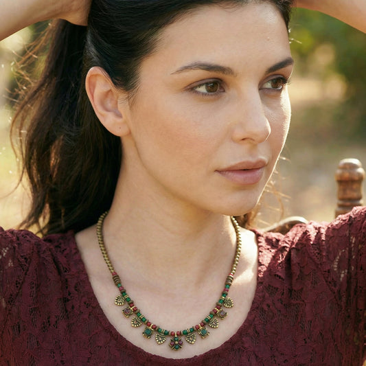 Woman wearing a decorative necklace outdoors