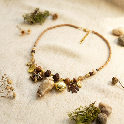 Necklace with natural elements on a textured surface