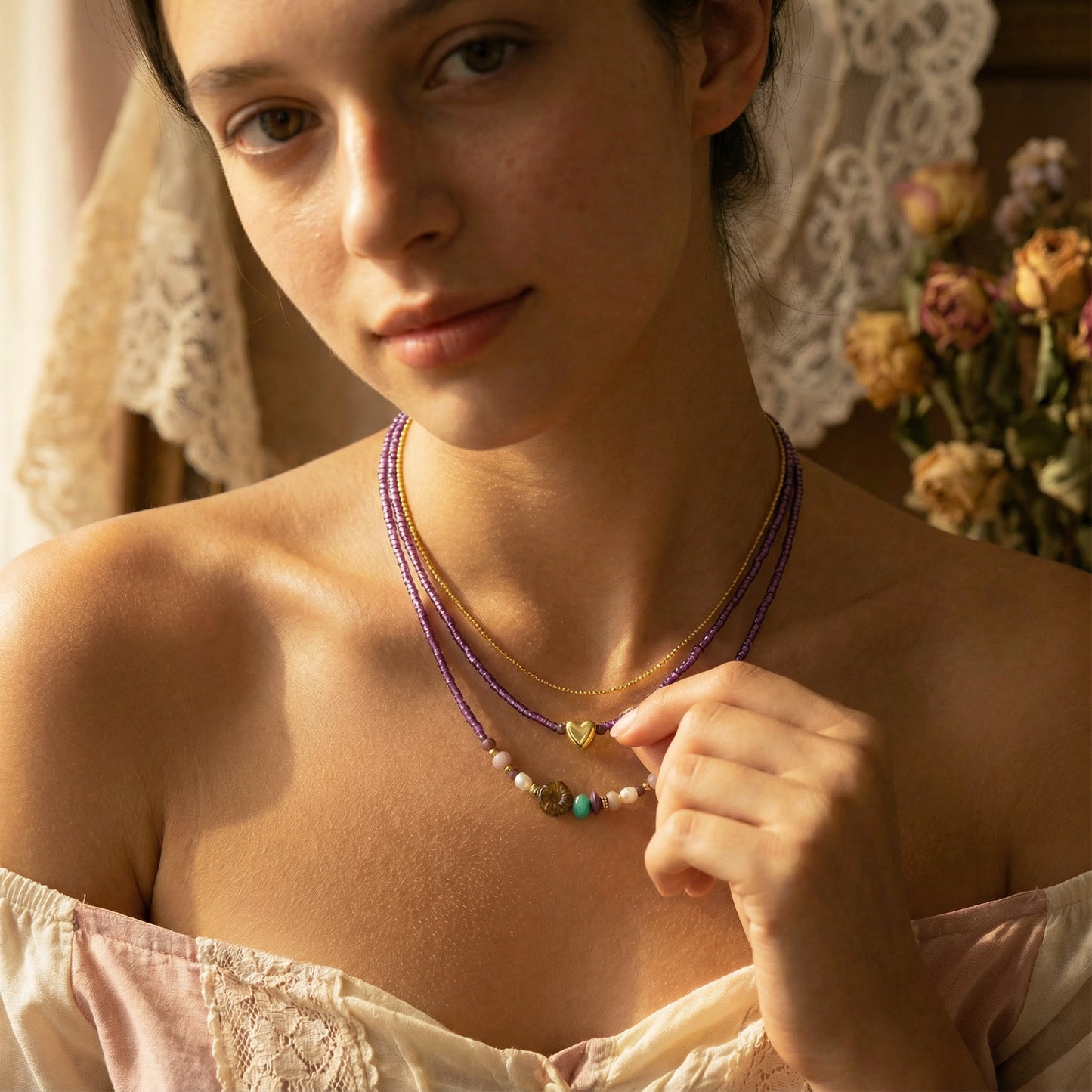 Woman wearing a necklace with a soft, warm background